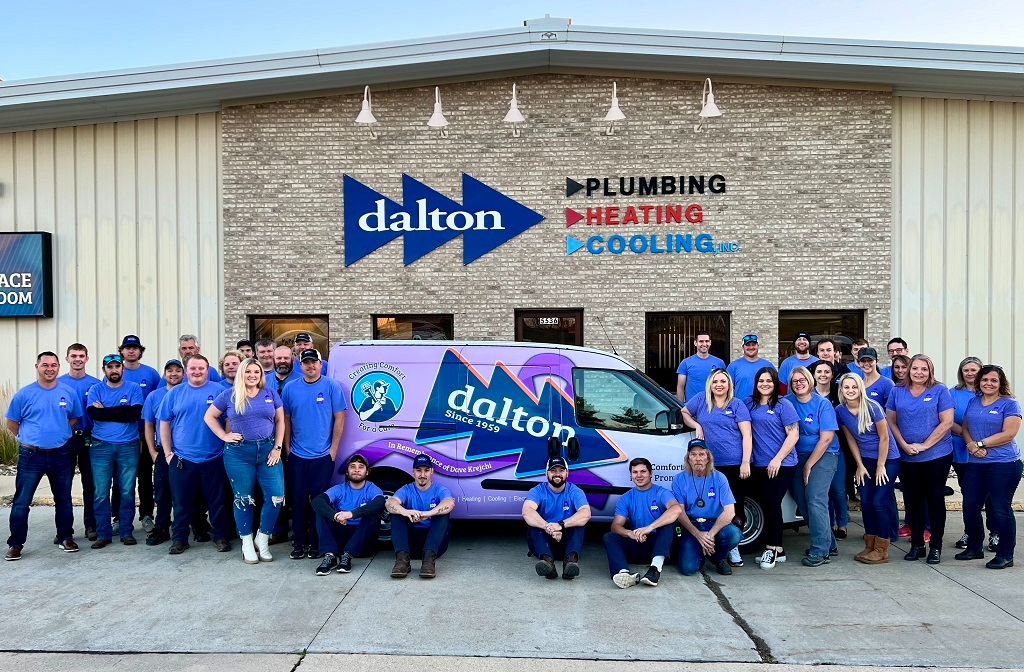 Dalton Plumbing, Heating, Cooling, Electric and Fireplaces, Inc. team and van in front of office
