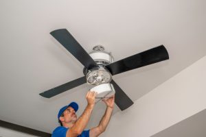 electrician-works-on-ceiling-fan